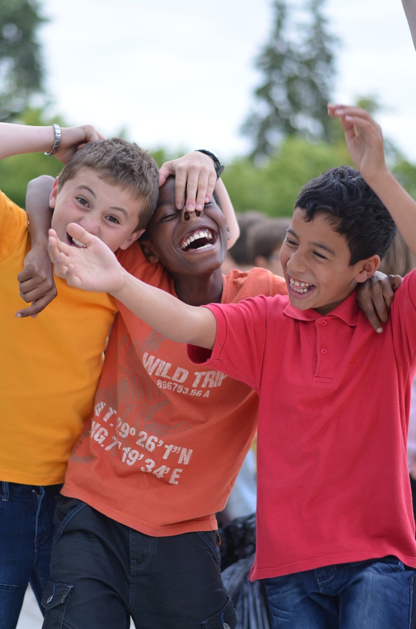 Three children playing happily together